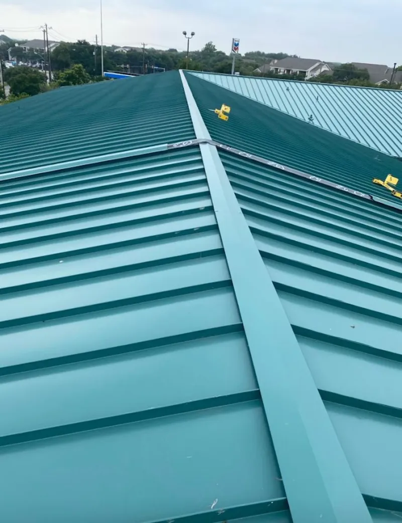 Green commercial metal roof ridge and valley for Metal Roof Repair in Pineville
